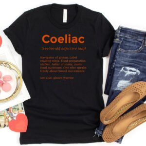 SHIRTS-2024-Coeliac-Definition-Shirt-ORANGE-on-BLACK-1-Bella-3001-Womens